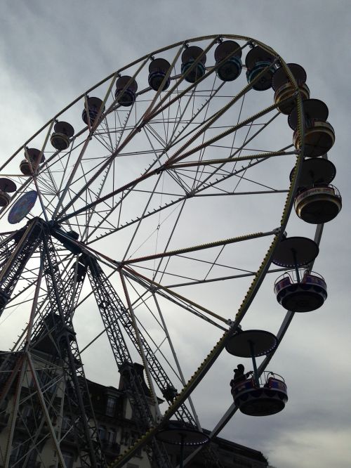 amusement park wheel dramatic overcast