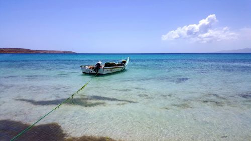 anchored boat coast