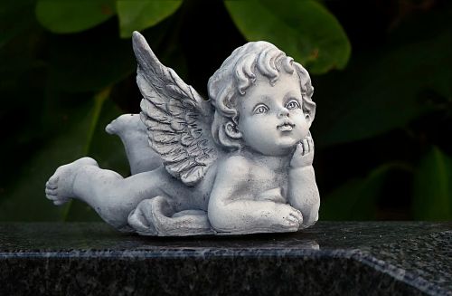 angel figure lying