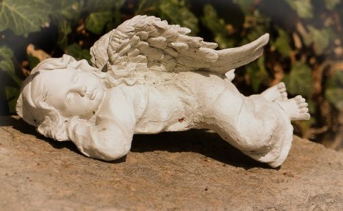 angel figure sleeping