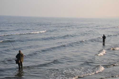 angler fishing sea