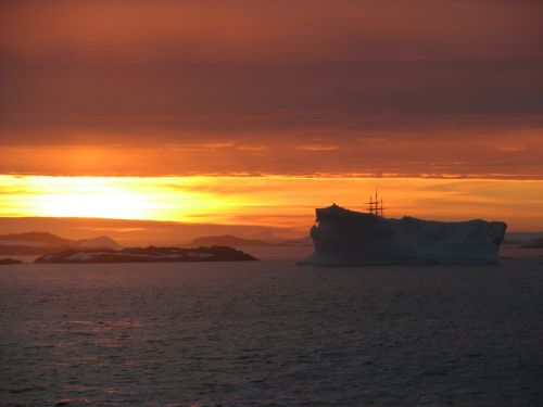 antarctica iceberg sunset