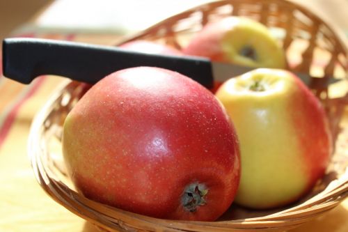 Apple In Basket With Knife