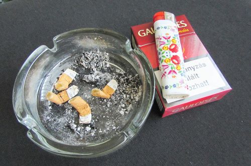 ashtray cigarettes cigarette butts