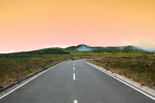 asphalt grass hills