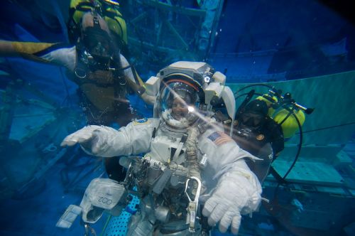 astronaut spacesuit under water