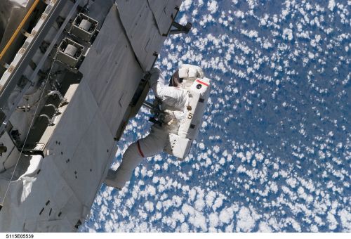 astronaut spacewalk shuttle