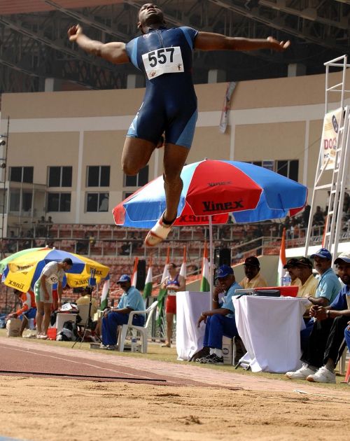 athlete long jump competition