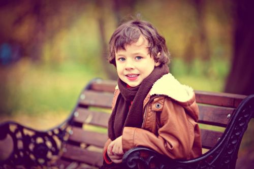 autumn bench child in park