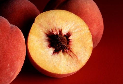 autumn red peaches sliced whole