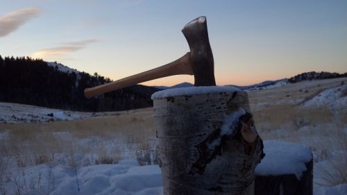 axe sunrise split wood