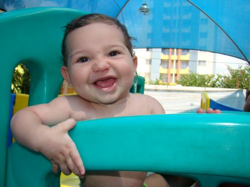 baby smiling pool
