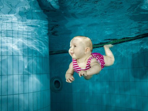 baby swimming underwater