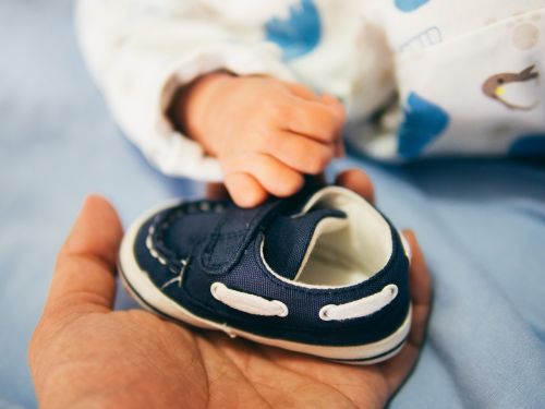 baby footwear hands