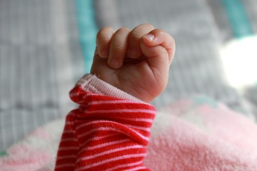baby fist infant hand