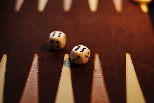 backgammon board  dice  sixes