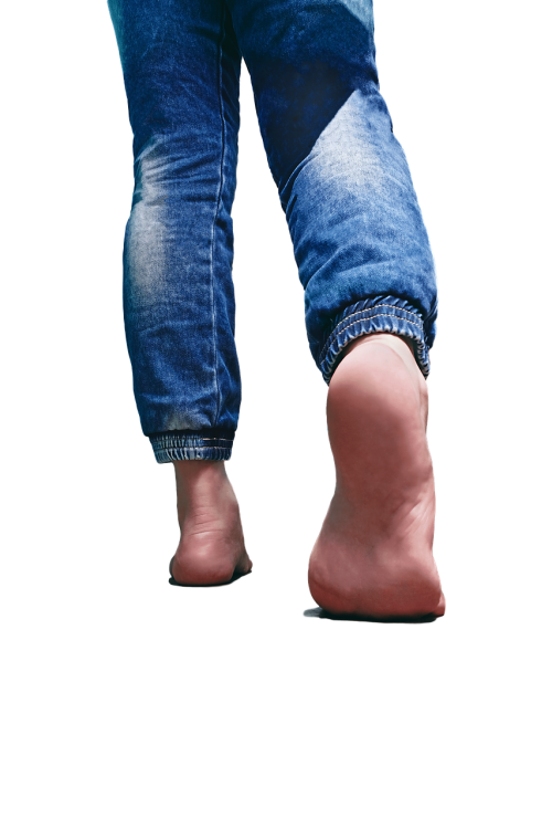 backlit barefoot blue jeans