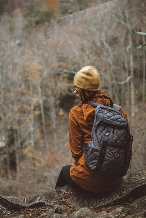 backpack people sitting