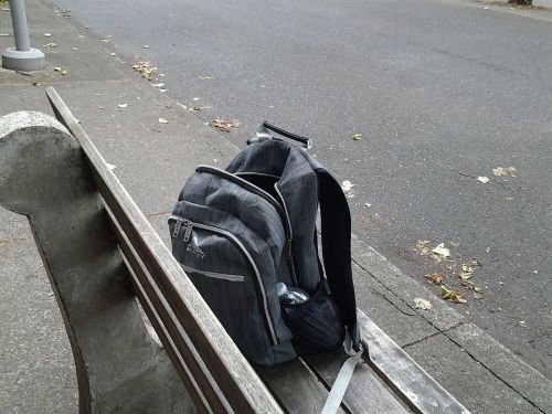 backpack bench outdoors