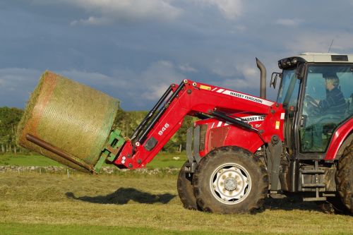 baling hay tractor