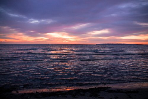 baltic sea  sunset  water