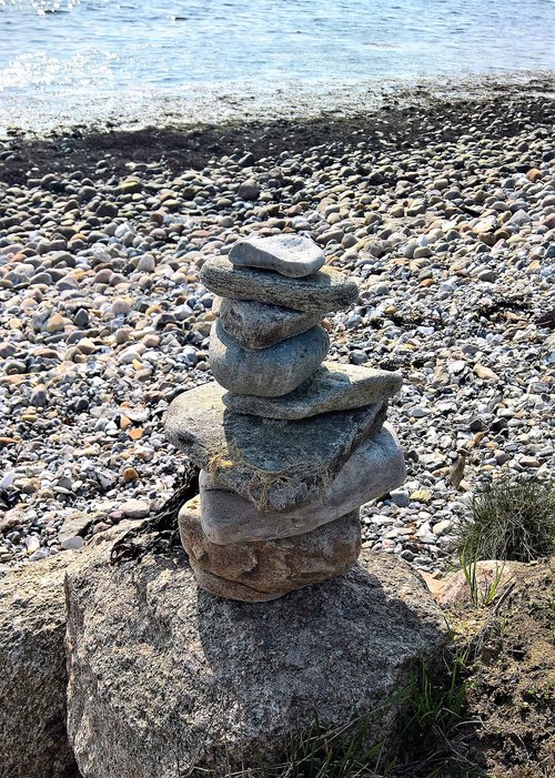 baltic sea beach  stone figure  successive laminated stones