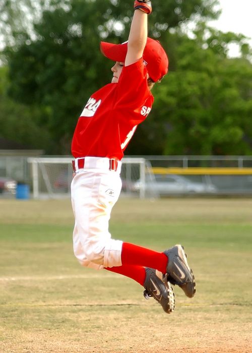 baseball leaping player