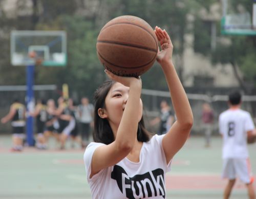 basketball girls shoot a basket