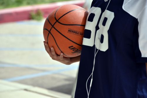 Basketball Player Holding Ball