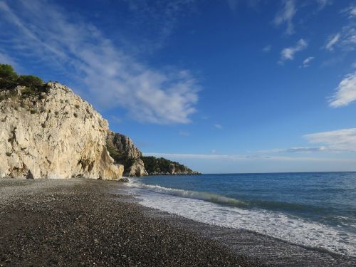 beach rock sky