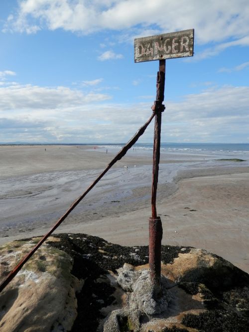 beach danger sign