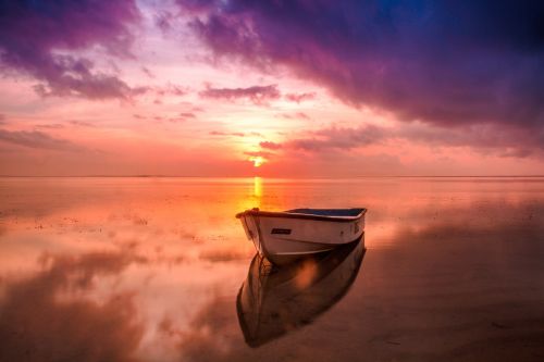 beach boat dawn