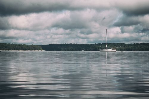 beach boat cloudy