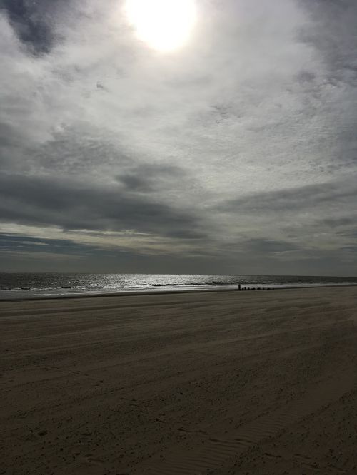 beach sand clouds