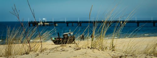 beach fishing boat sand beach