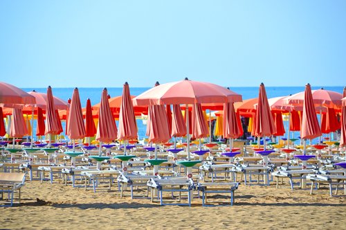 beach  sun umbrellas  water
