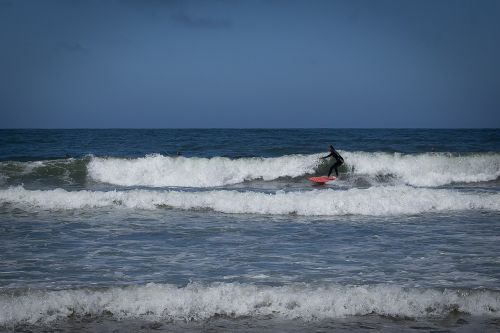 beach surfing waves