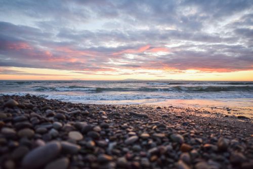 beach sunset pebbles