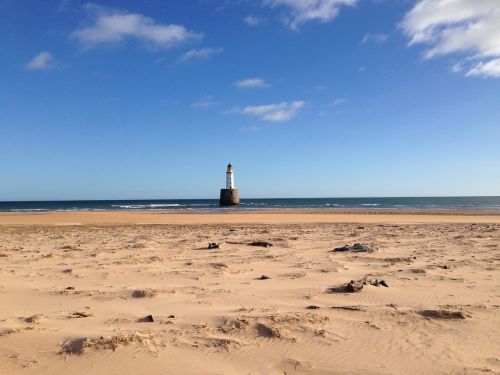 beach lighthouse sea