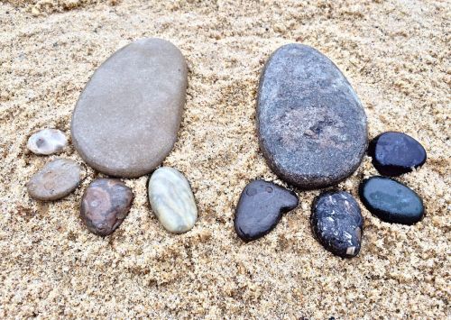 beach rocks feet