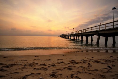 beach pier sunrise