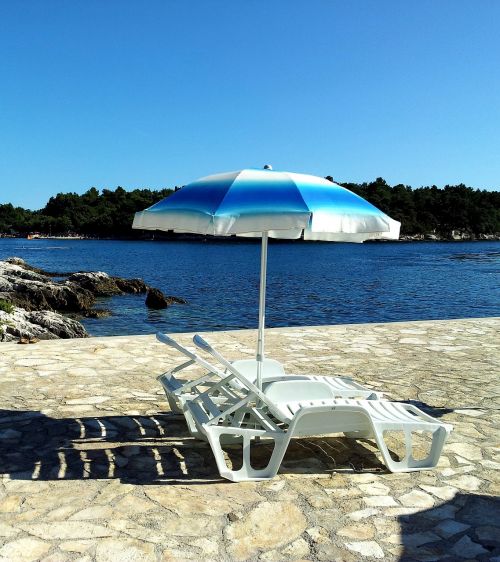 beach umbrella beach chairs
