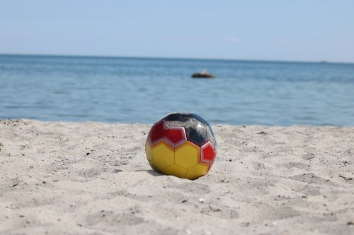 beach volleyball  ball  sand