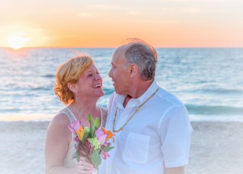 beach wedding happy couple sunset