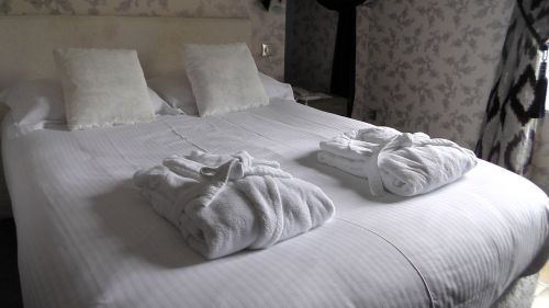 bed bedding hotel