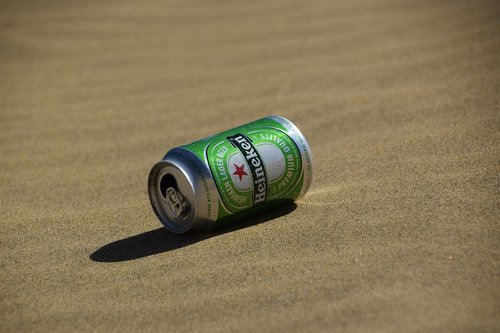 beer  beer can  sand