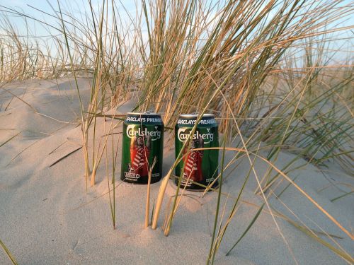 beer cans beach dune