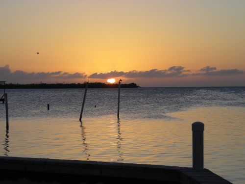 belize sunset water