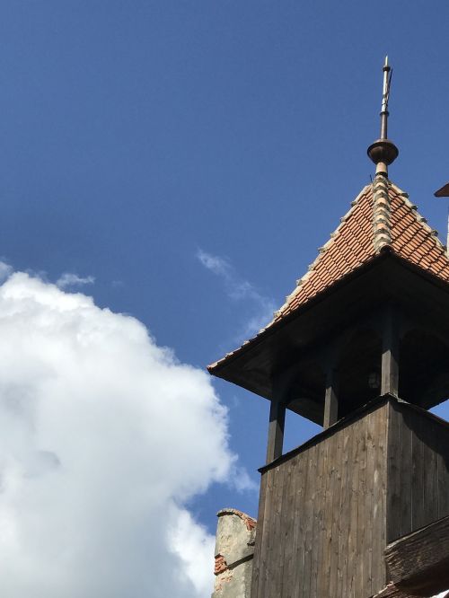 bell tower castle clouds