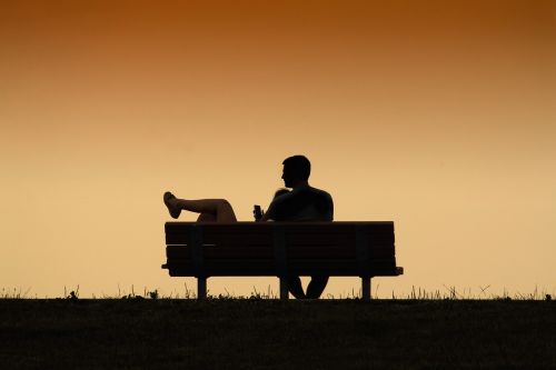 bench couple sunset